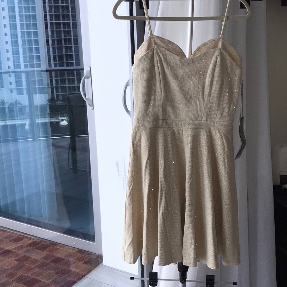 Beige and gold dress